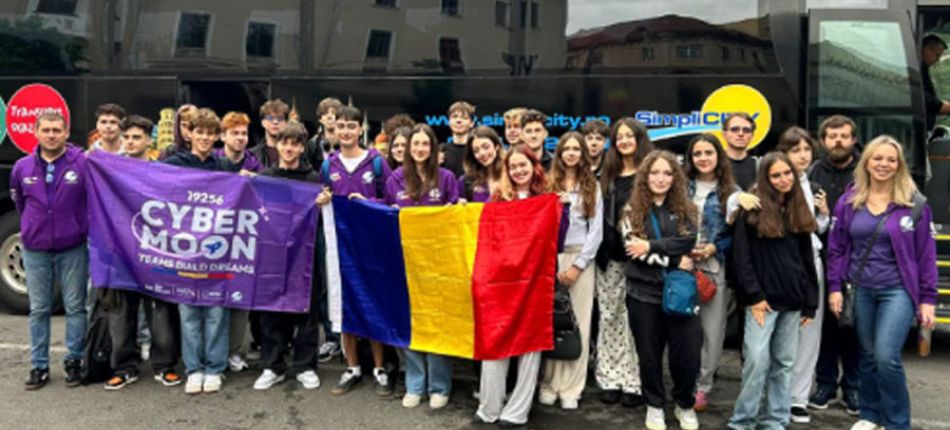 Group of students posing in front of a bus, holding a purple 'Cyber Moon' banner and a Romanian flag.