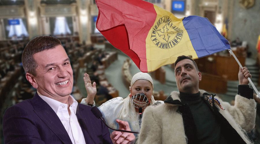 Man in a suit speaks into a microphone at a political rally in a large chamber, with two supporters in the foreground—one with a fur coat raising a red-yellow-blue flag and the other wearing a white headscarf and a face covering.