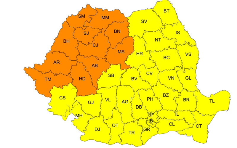 Map of Romanian counties with orange regions in the northwest and yellow elsewhere, indicating two color zones for counties