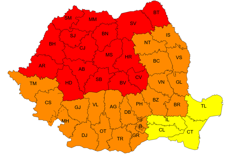 Map of Romania with counties color-coded by risk: red for high, orange for medium, yellow for low, with two-letter county codes shown and borders outlining each county.