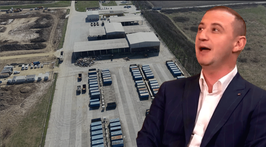 Aerial view of a logistics yard with rows of trailers and warehouses; a man in a suit appears in the foreground on the right.